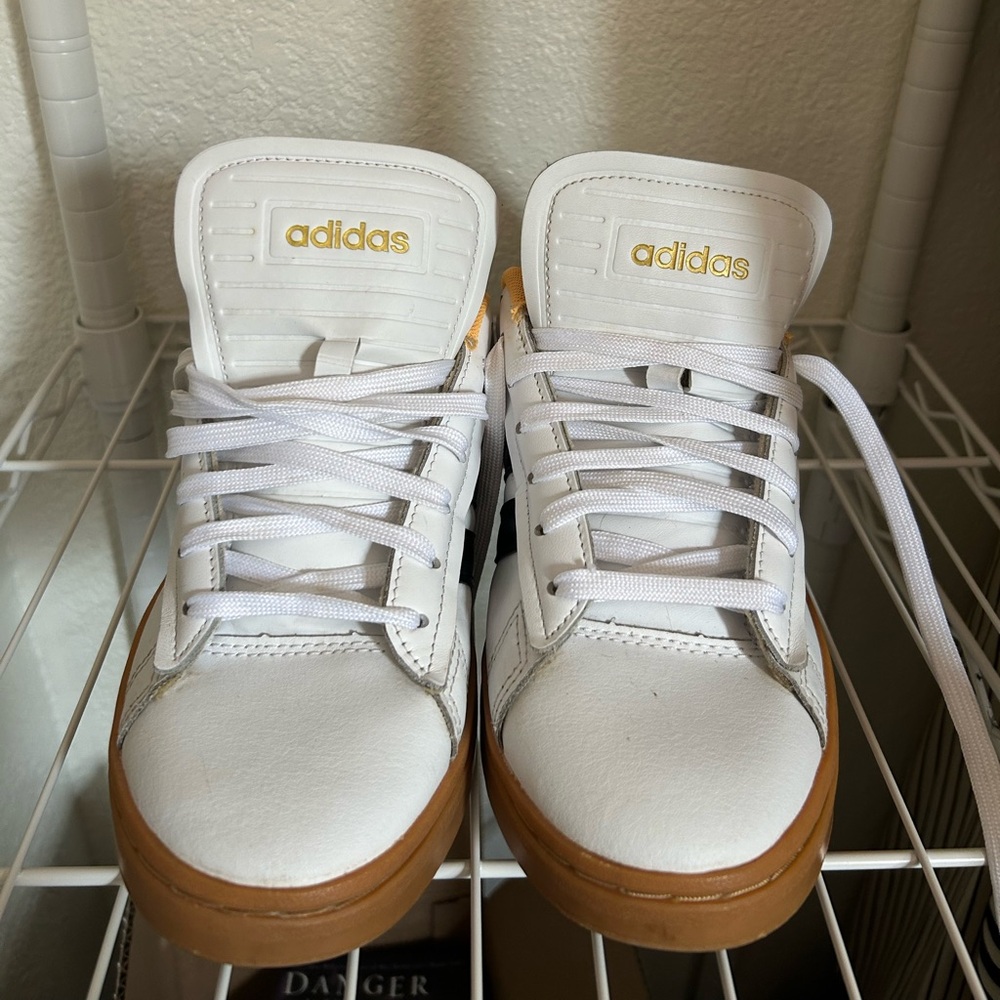 Adidas White Sneakers with Gold Accents and Brown Soles